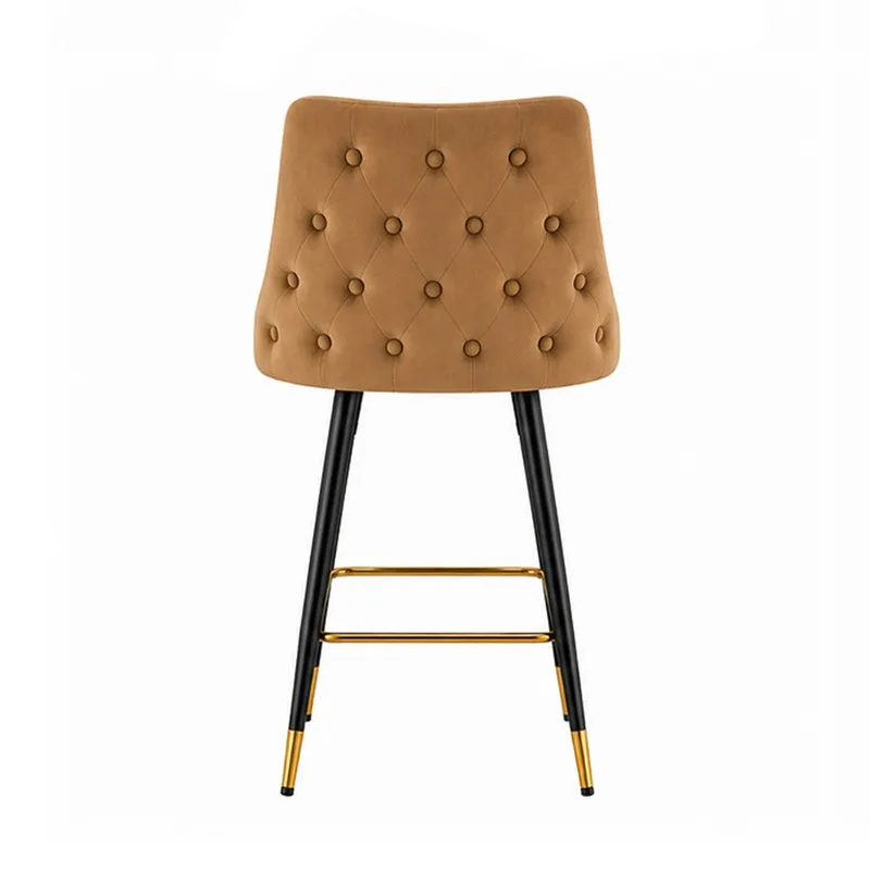 Back view of a brown tufted bar chair with black legs and gold-toned footrest