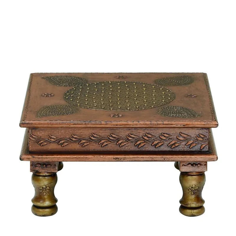 Front view of a brown wooden stool with a patterned top and short legs