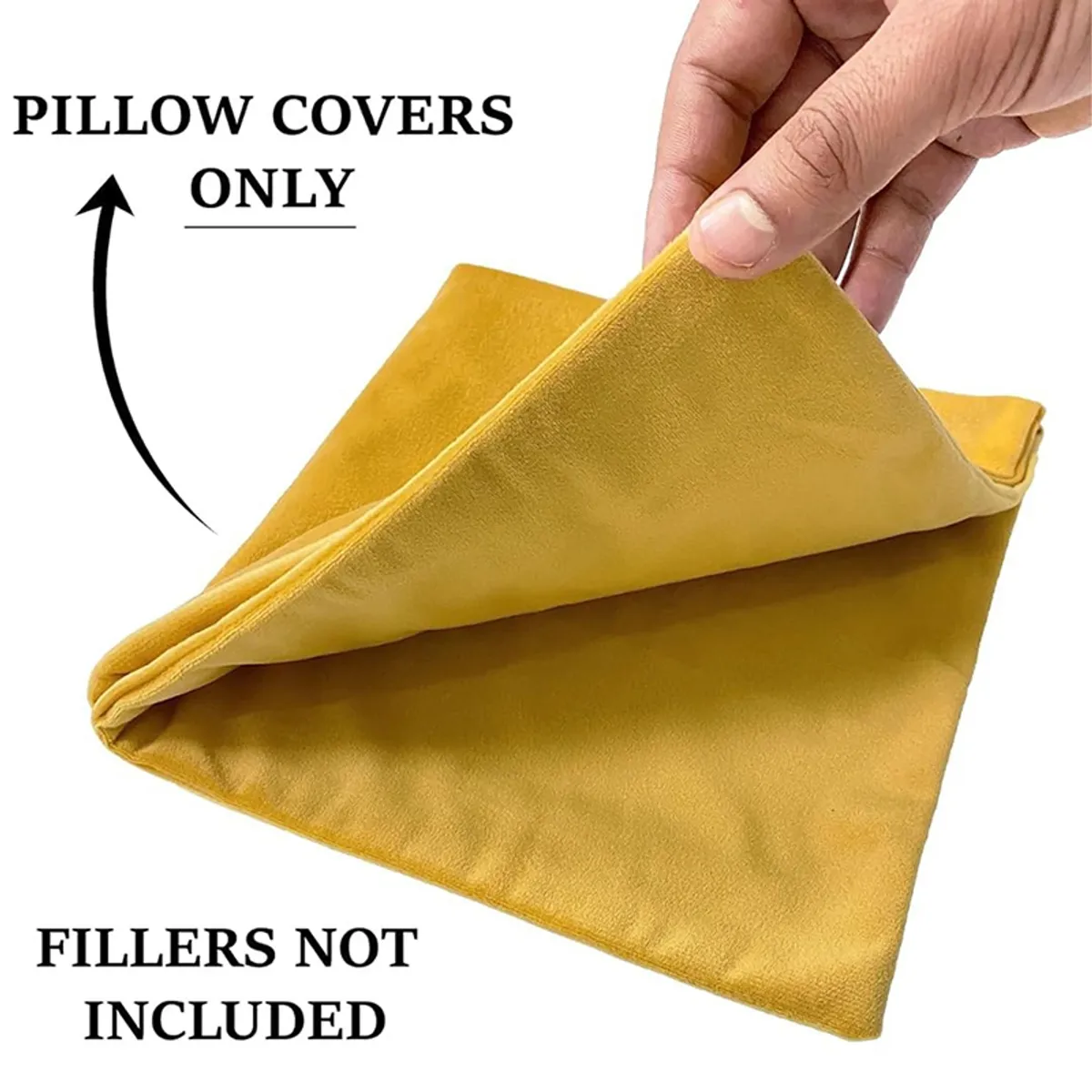 Close-up of a yellow velvet cushion cover being held open
