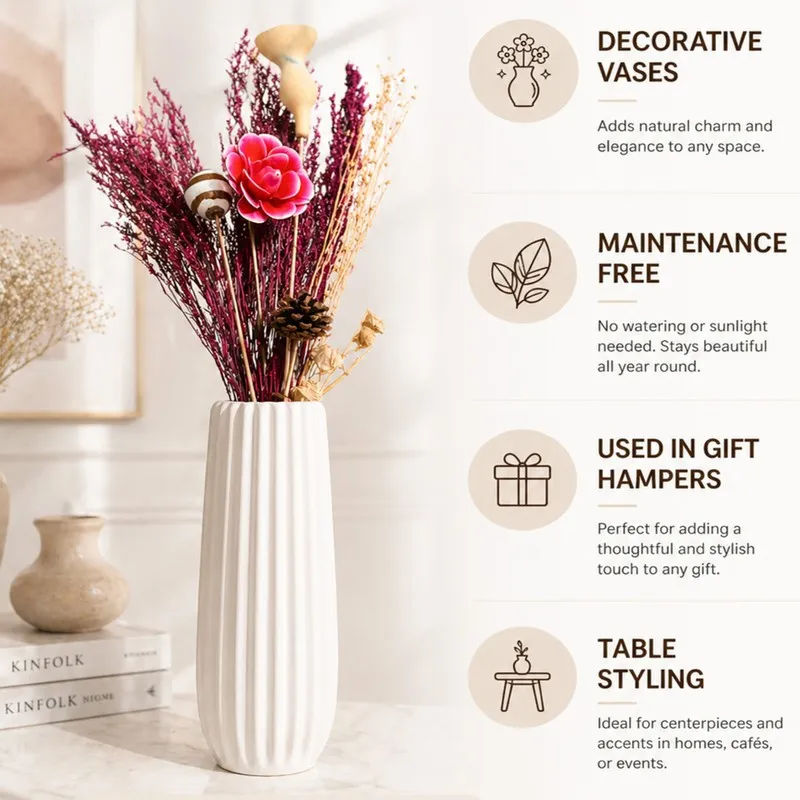 Pink dried flower bouquet displayed in a tall white vase