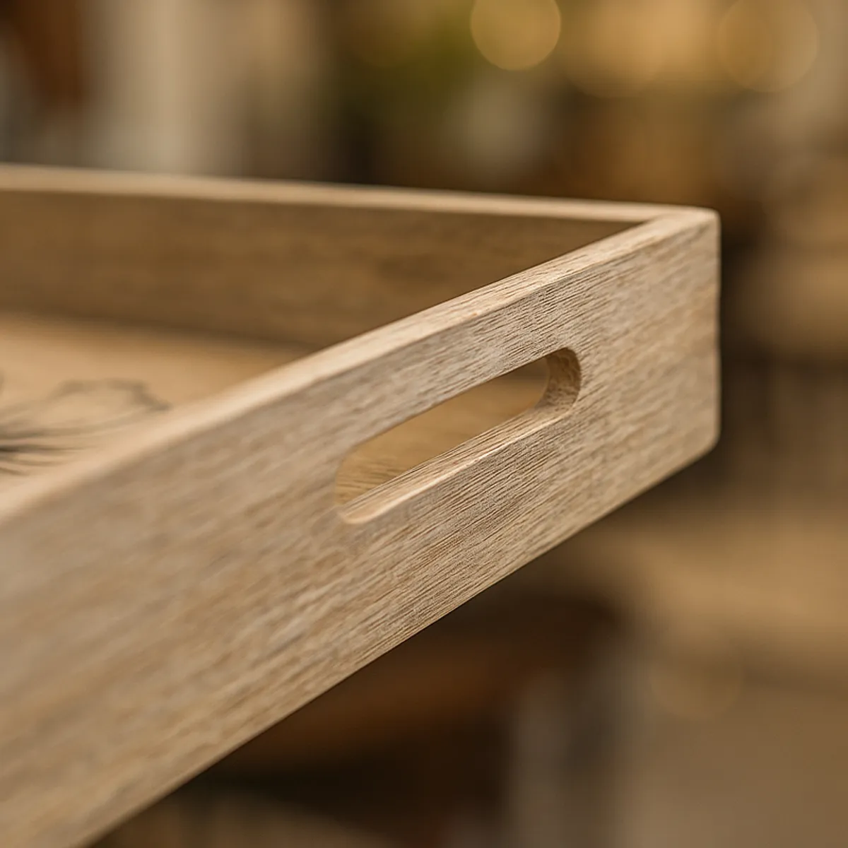 Close-up of a wooden serving tray showing its built-in cutout handle