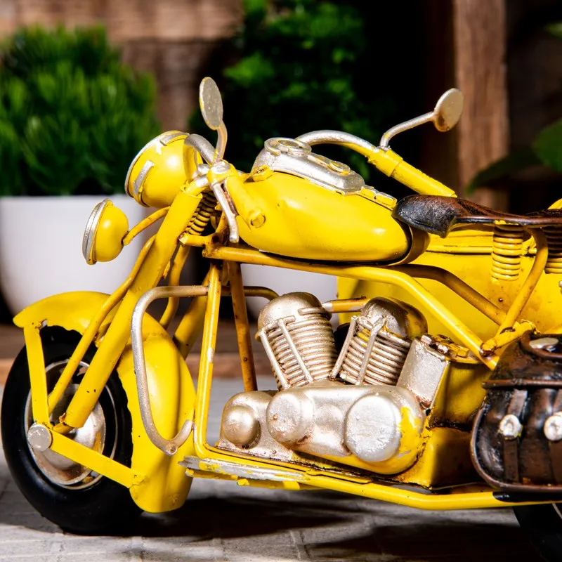 Close-up of the yellow motorcycle front and engine details
