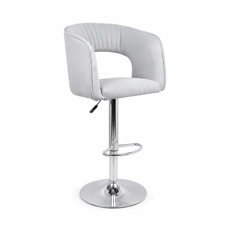 Angled view of grey velvet bar chair with ribbed upholstery and footrest
