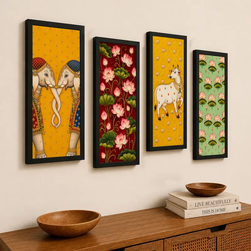 Set of four framed Pichwai paintings displayed above a wooden console with bowls and books.