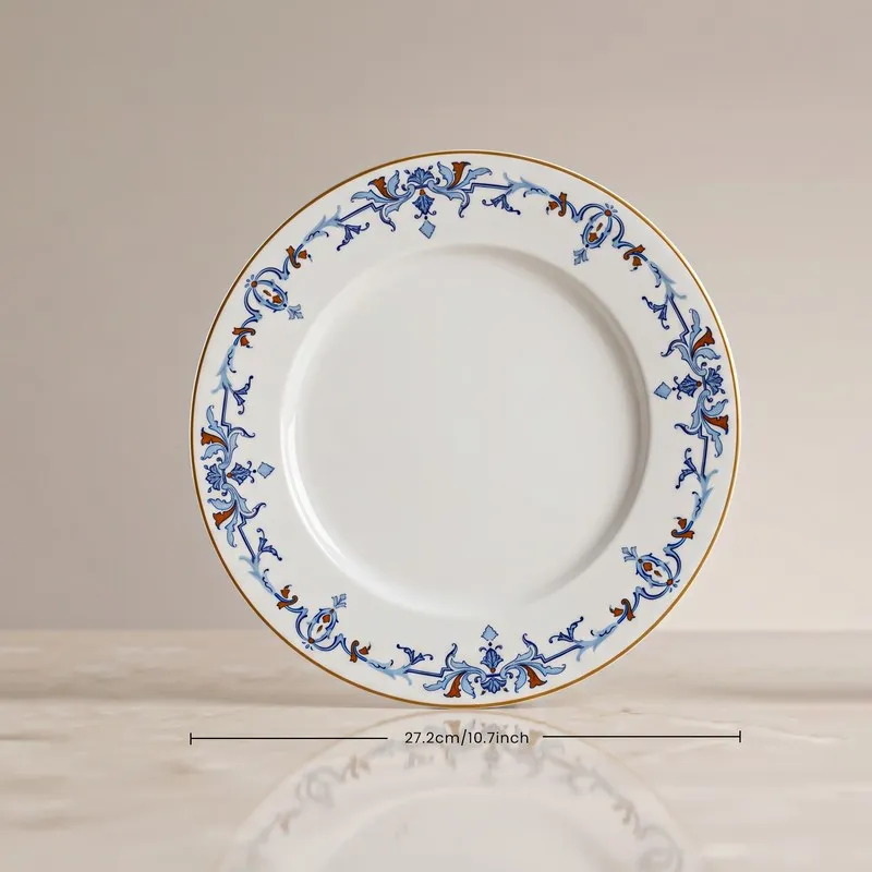 Single round blue and white dinner plate with decorative border