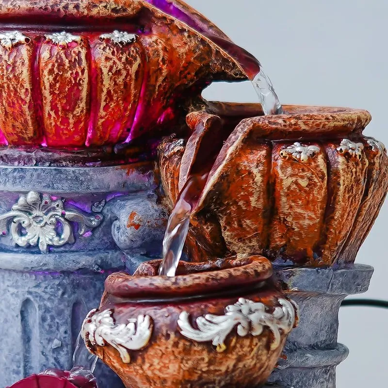 Detailed close-up of the upper cascade and ornate brown bowl