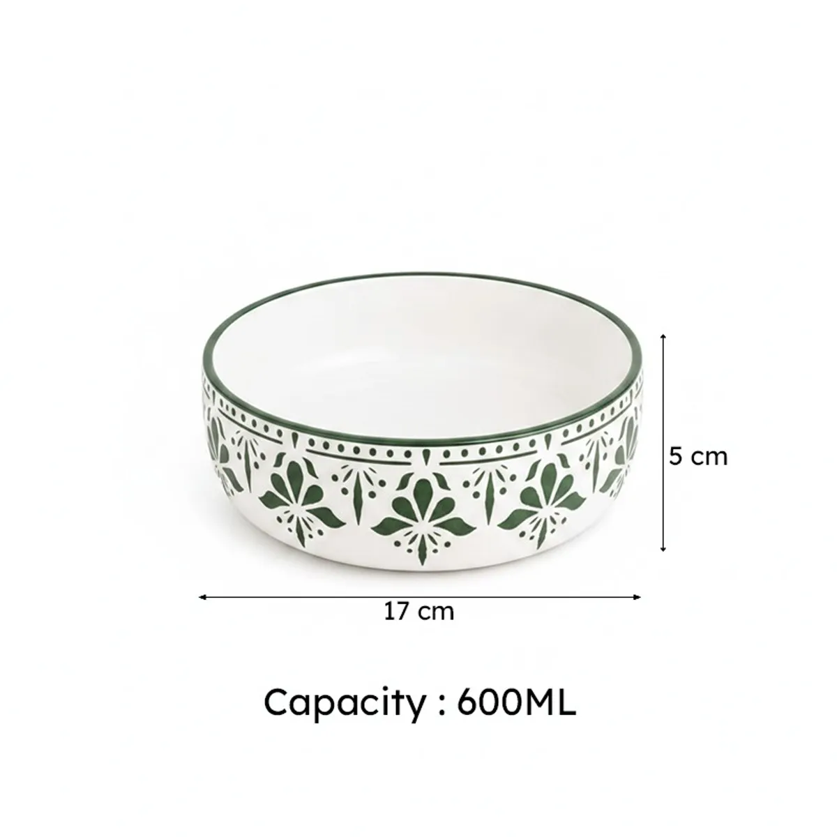 Single green floral ceramic bowl shown against a white background