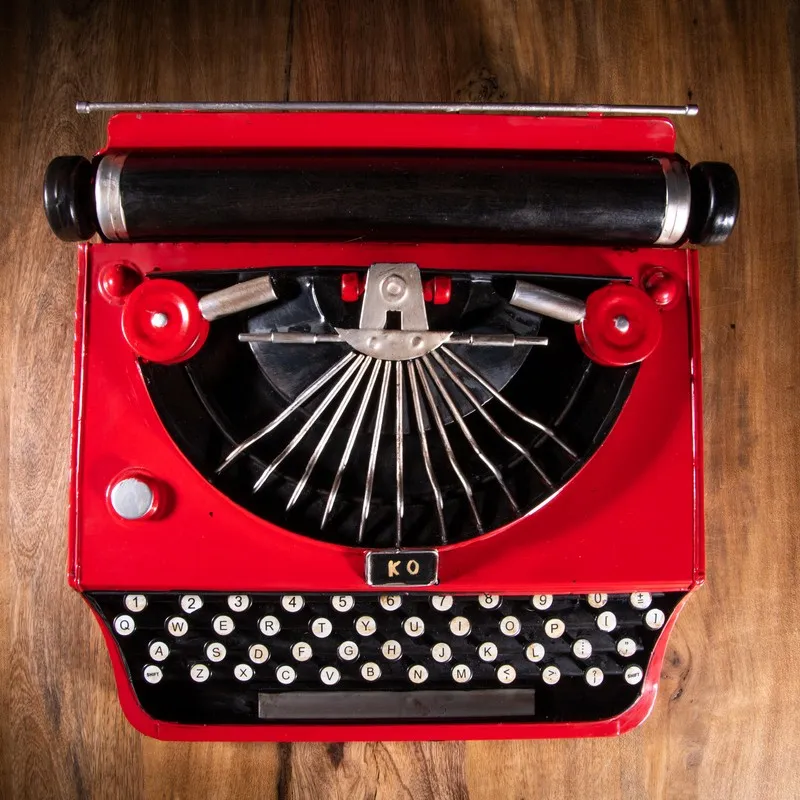 Top view of the red retro typewriter showpiece