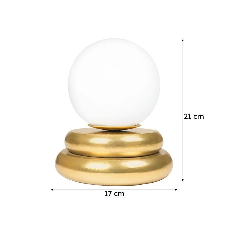 White globe table lamp with gold base shown with 17 cm width and 21 cm height