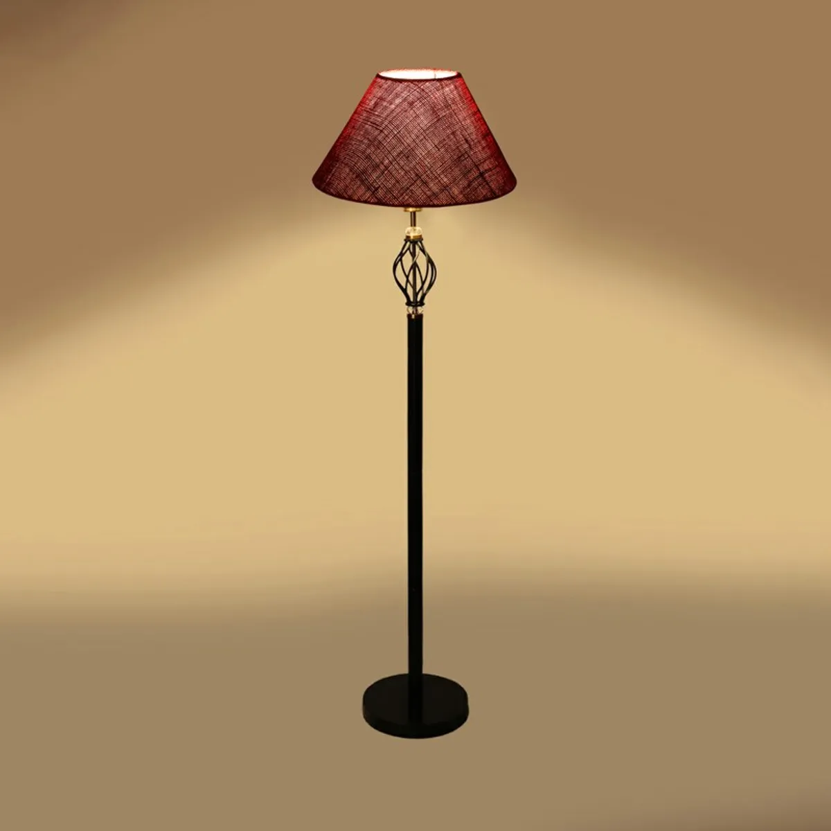 Red floor lamp glowing softly against a warm beige background.