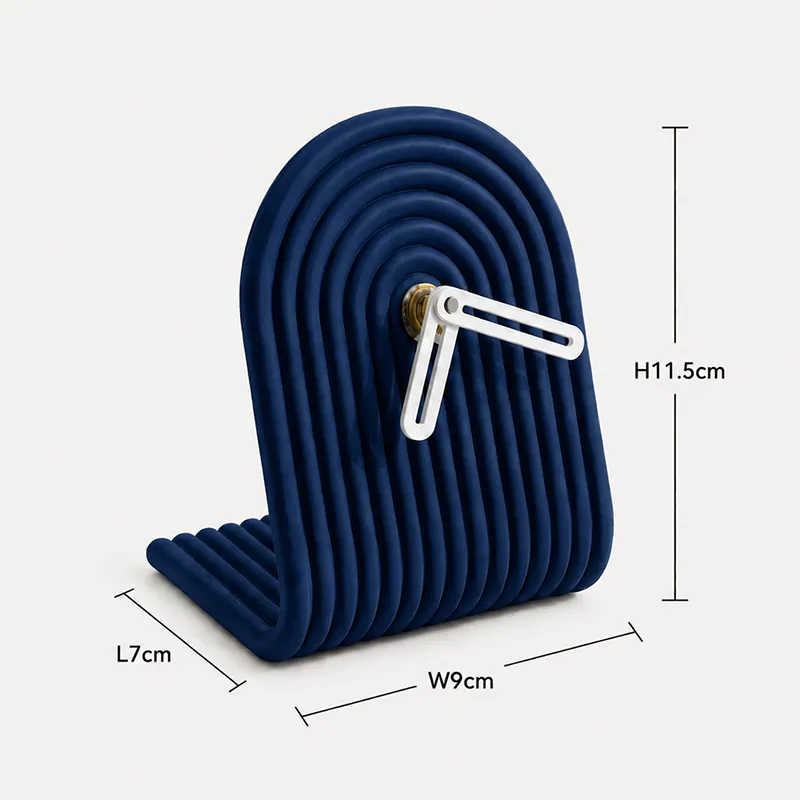 Blue arched ribbed table clock shown against a plain background