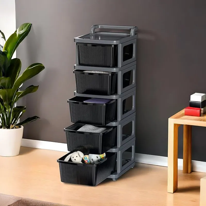 Black and grey five-tier storage rack with open drawers in a modern room.