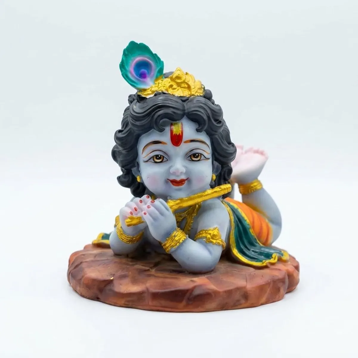 Front view of a multicolour Gopal idol with a glossy finish