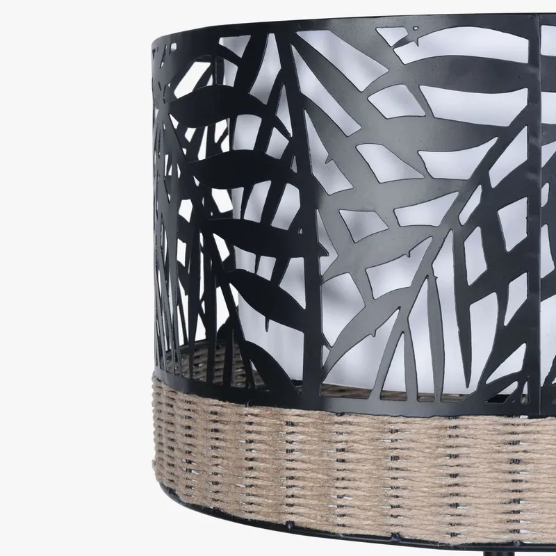 Close-up of black palm-pattern lamp shade with natural textured band