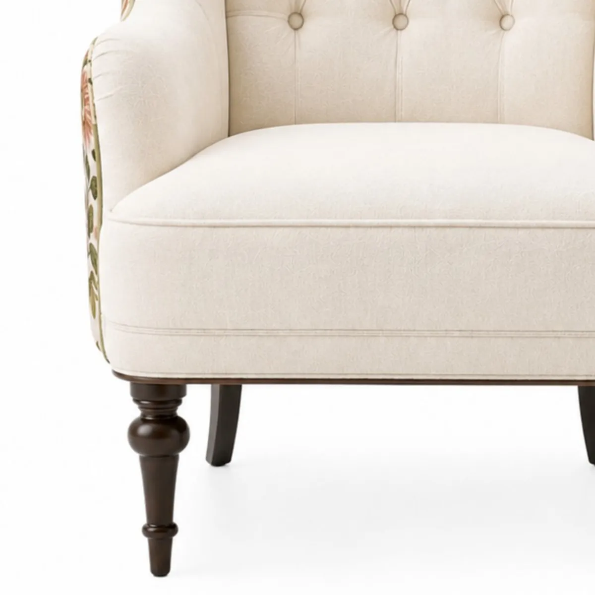 Close-up of cream upholstered seat and dark wooden front leg