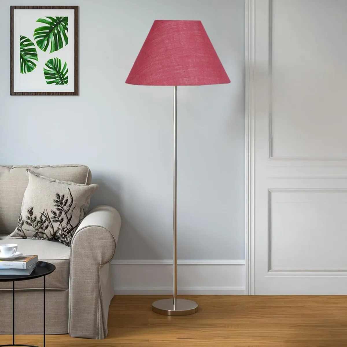 Rose blush floor lamp with conical shade in a bright neutral room