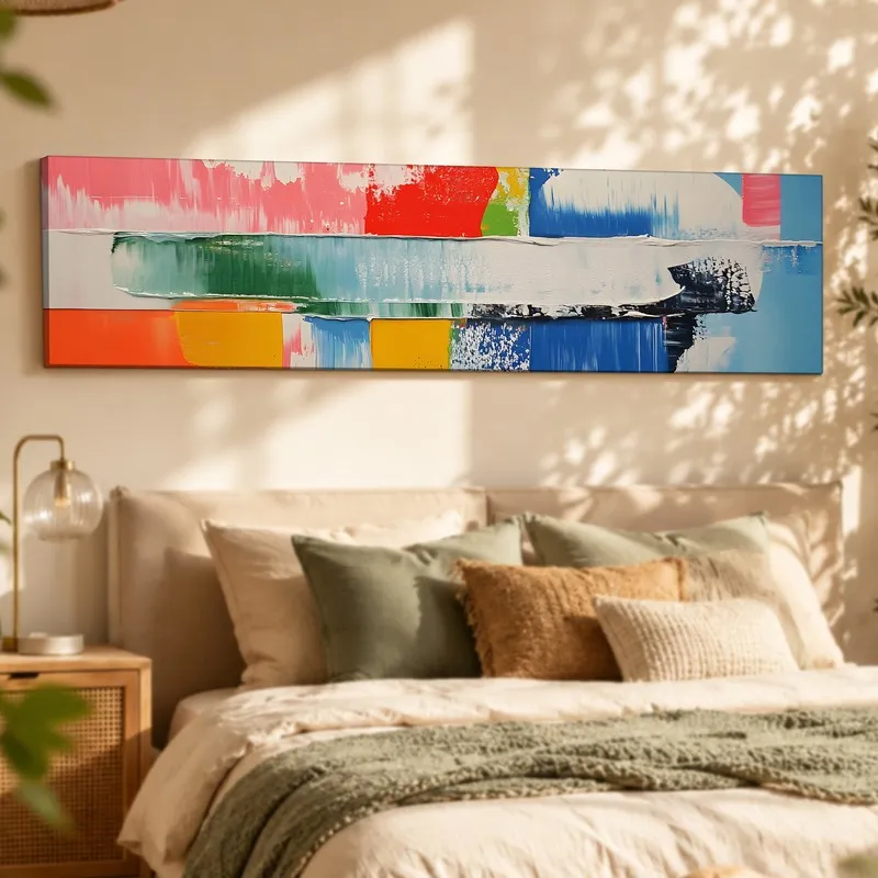 Multicolour abstract rectangular canvas wall art displayed above a bed