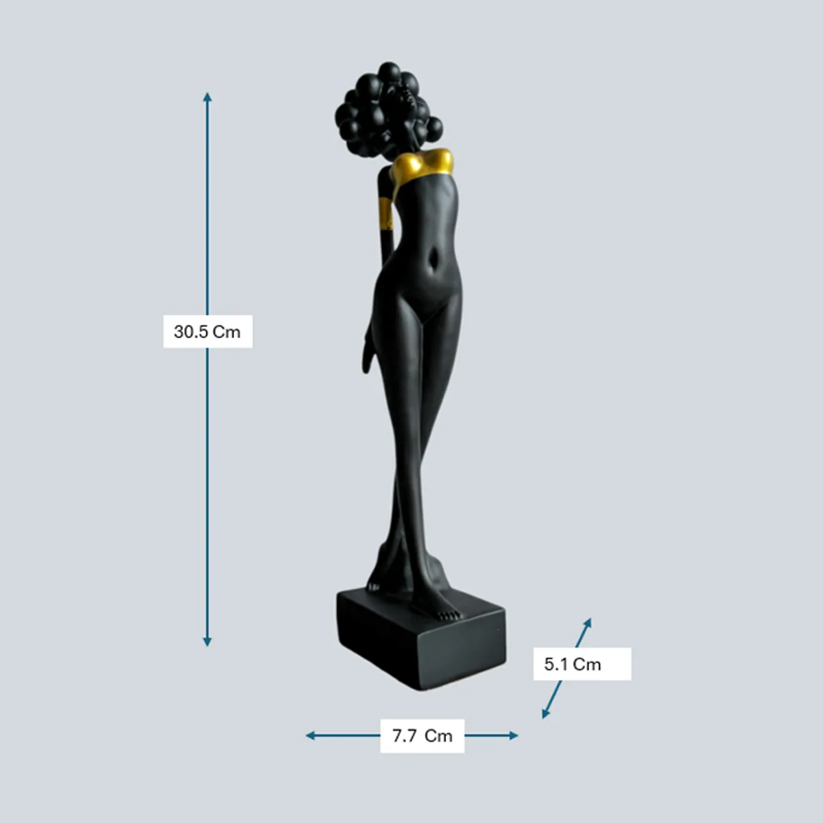Black and gold lady figurine shown with height and base measurements