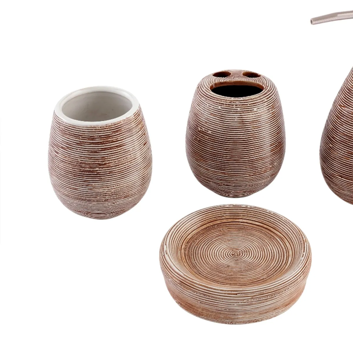 Close view of brown textured ceramic toothbrush holder, soap dish and dispenser