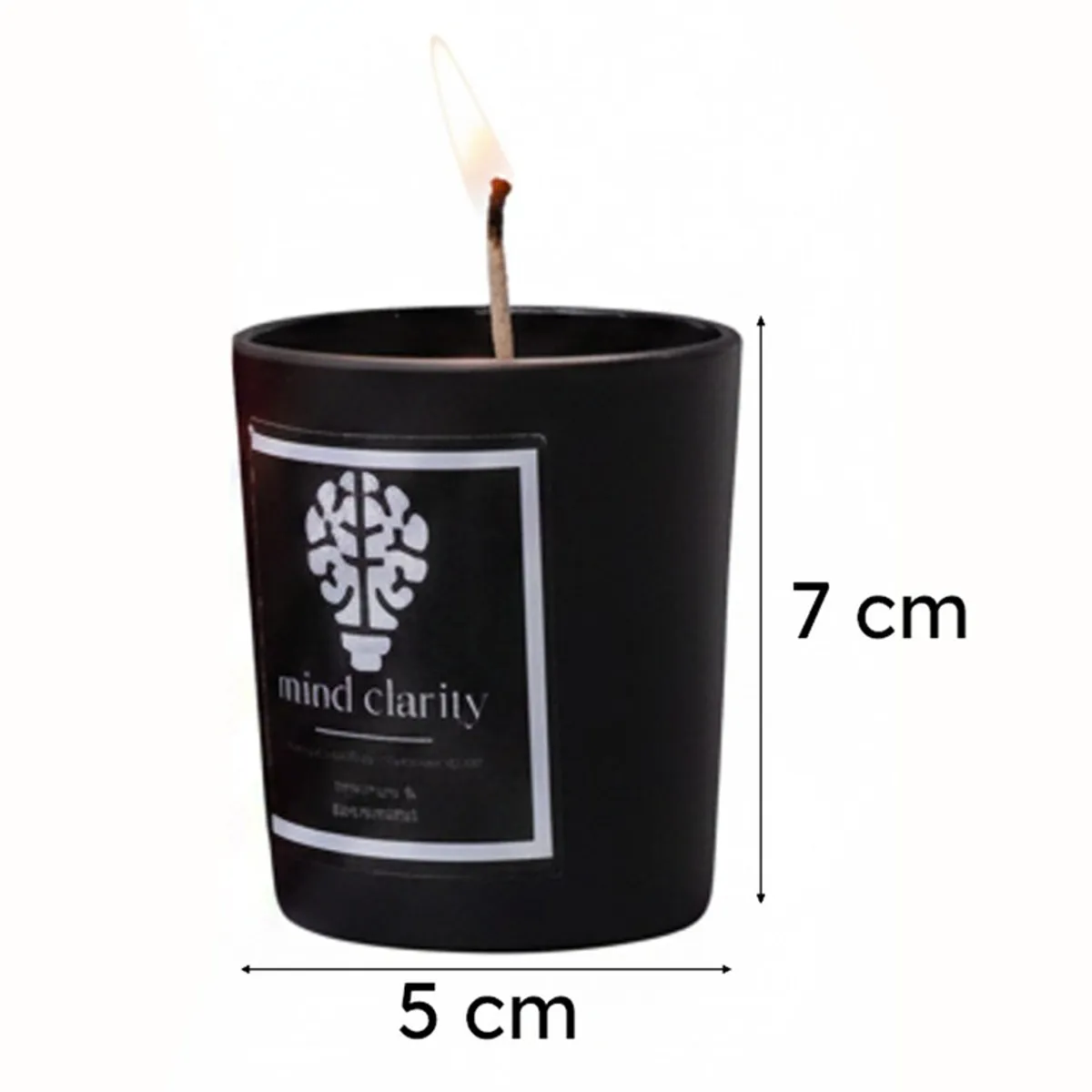 Close-up of a black cylindrical jar candle with a visible flame.
