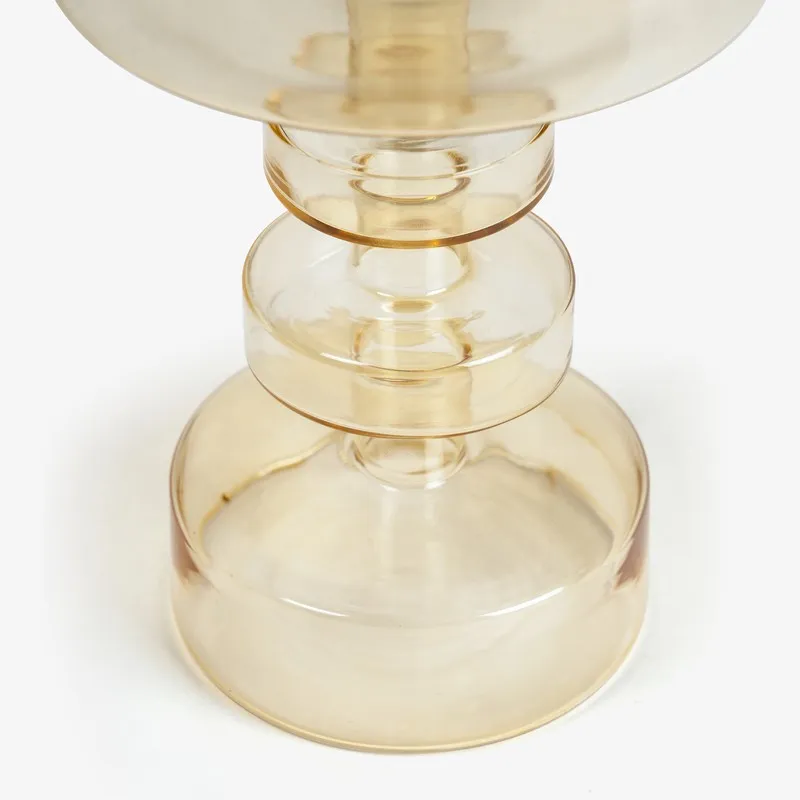 Close-up of the lower stacked glass base in amber finish