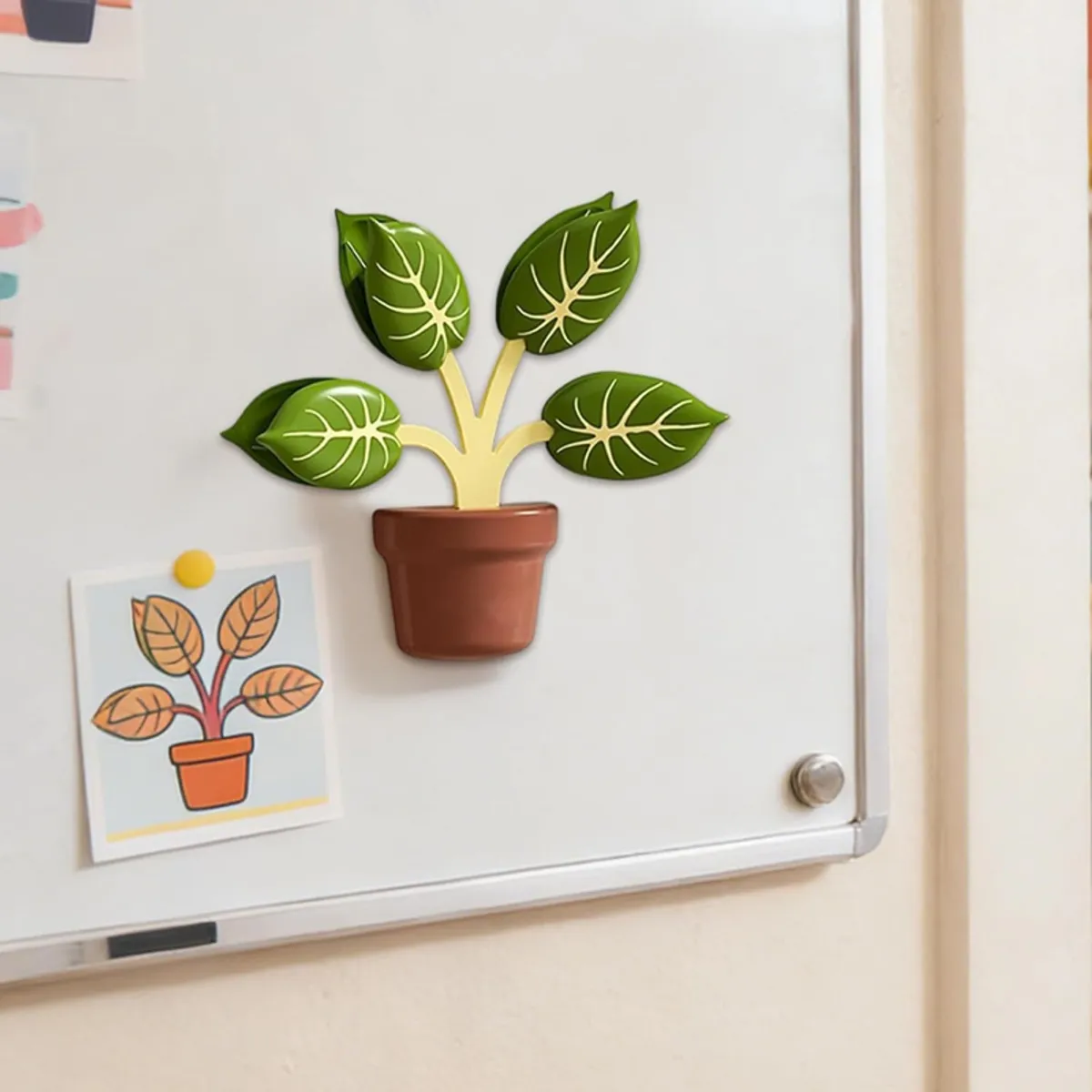 Plant-shaped magnetic clip holder displayed on a white board