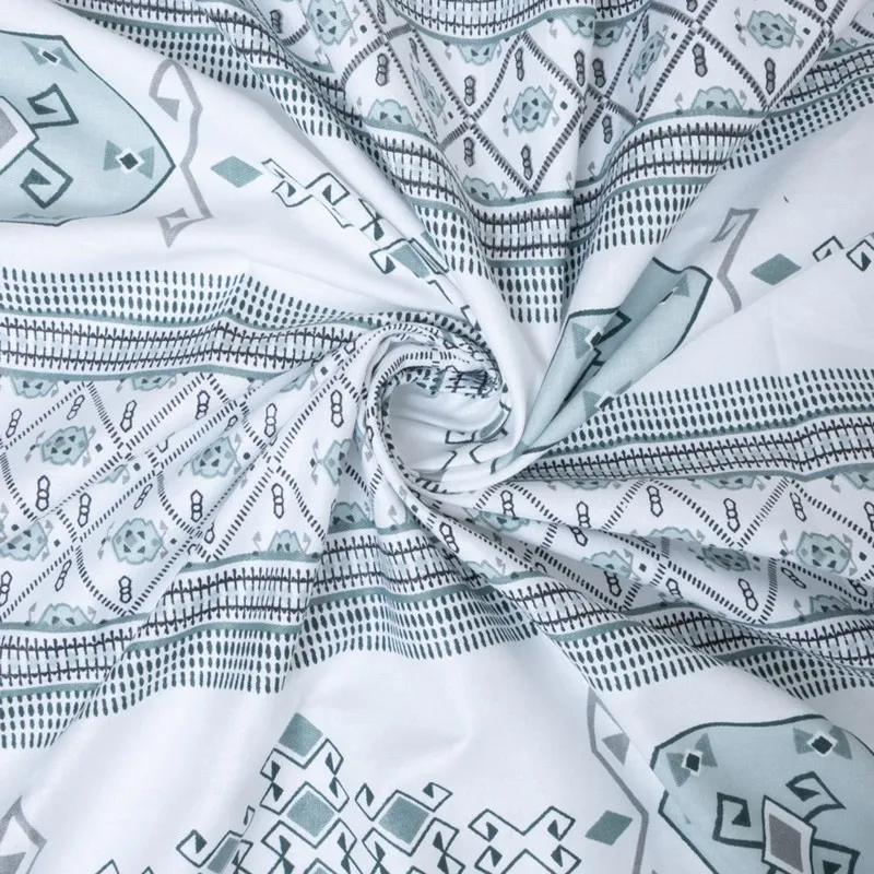 Close-up of blue and white printed cotton bedsheet fabric
