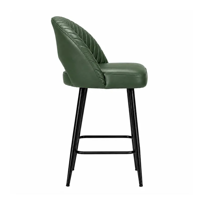 Side view of dark green bar chair with ribbed back and black legs