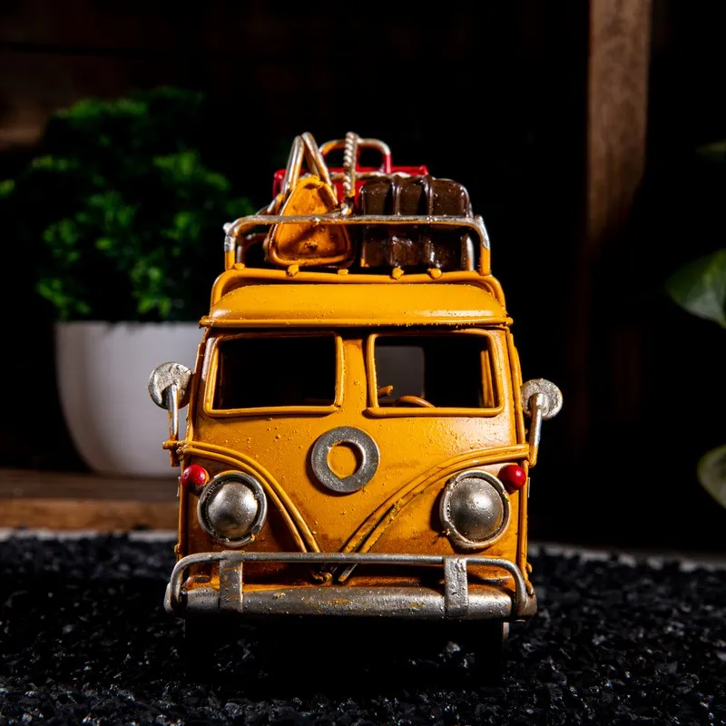 Front view of yellow caravan showpiece with silver detailing