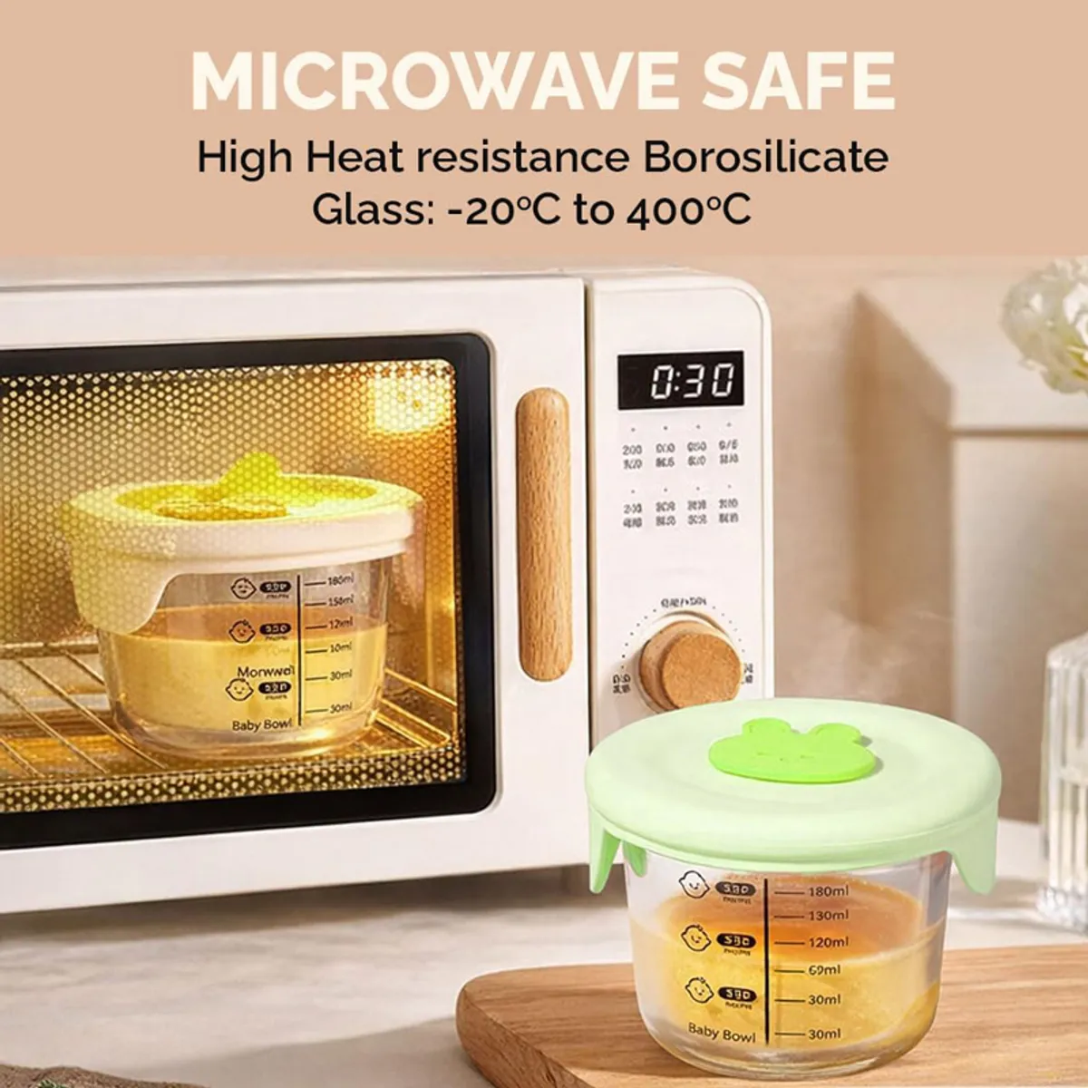 Glass food container near a microwave with a pastel green lid