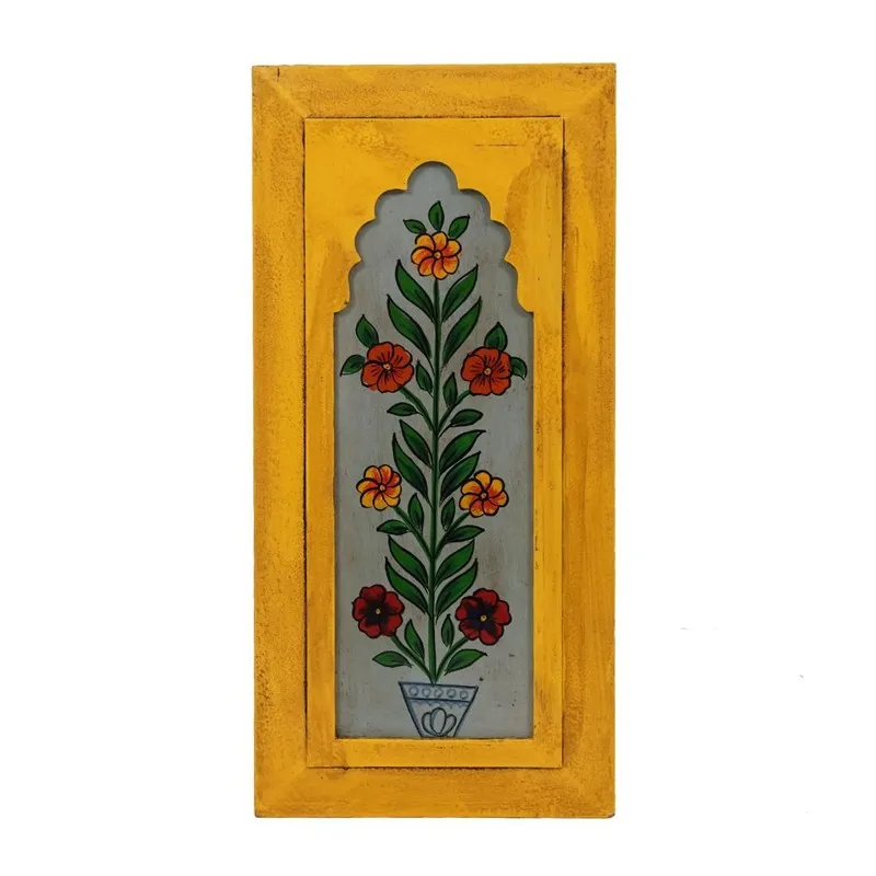 Front view of a yellow rectangular wall accent with painted floral design