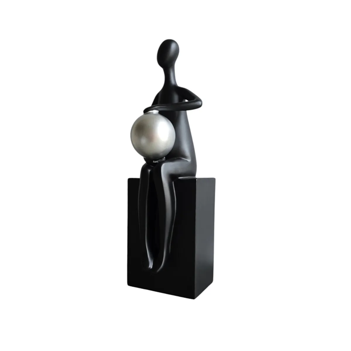 Black abstract man figurine holding a silver sphere against a white background