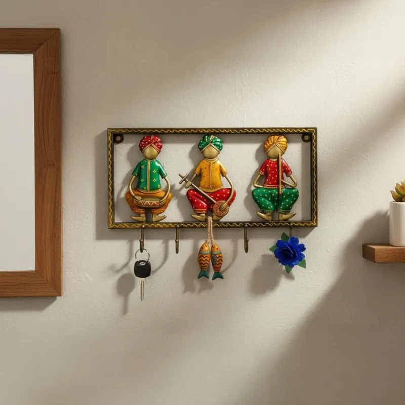 Multicolour wall-mounted metal key holder with folk musician figures