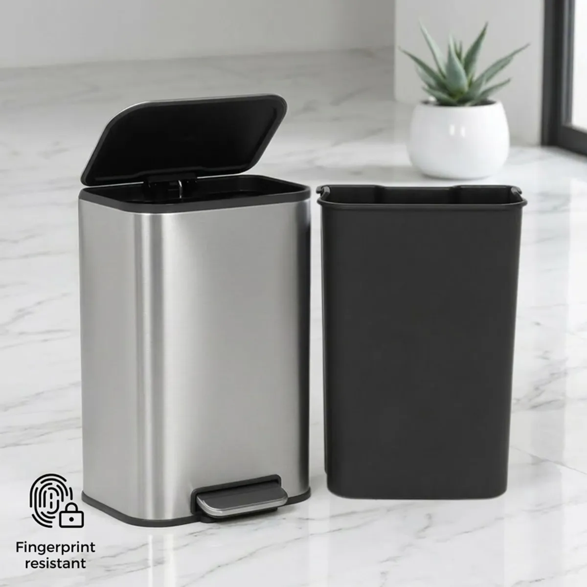 Open silver dustbin showing its black inner bin beside it