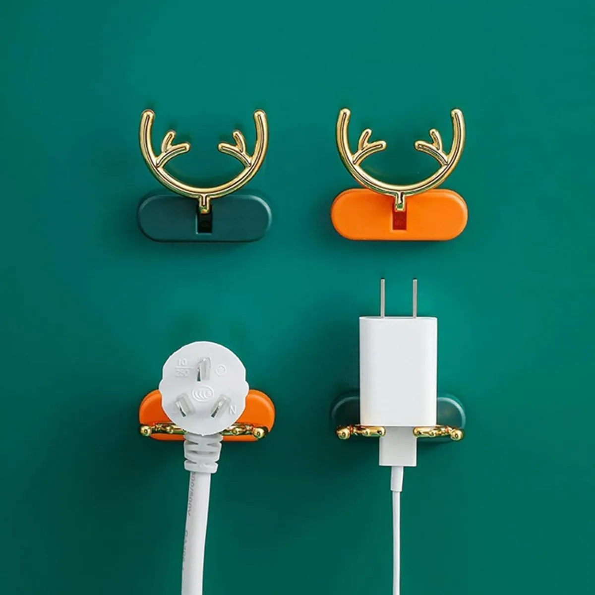 Set of four antler-shaped wall hooks in green and orange