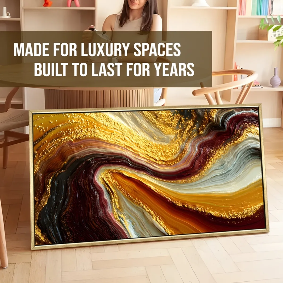 Large rectangular abstract painting with gold and burgundy swirls leaning indoors