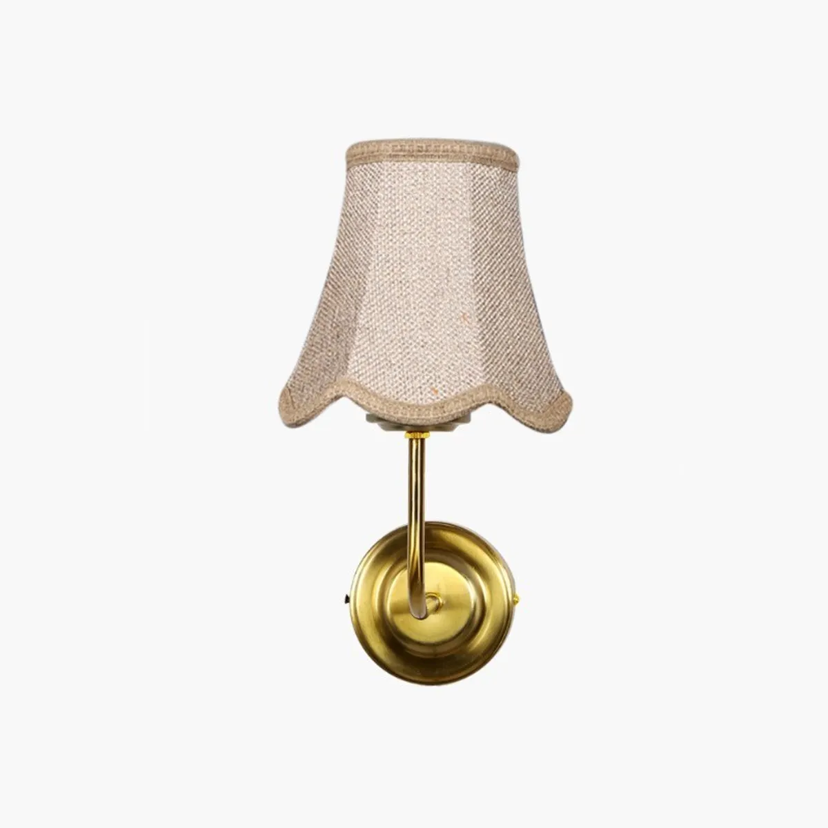 Front view of the beige shade and gold-toned wall lamp on a white background