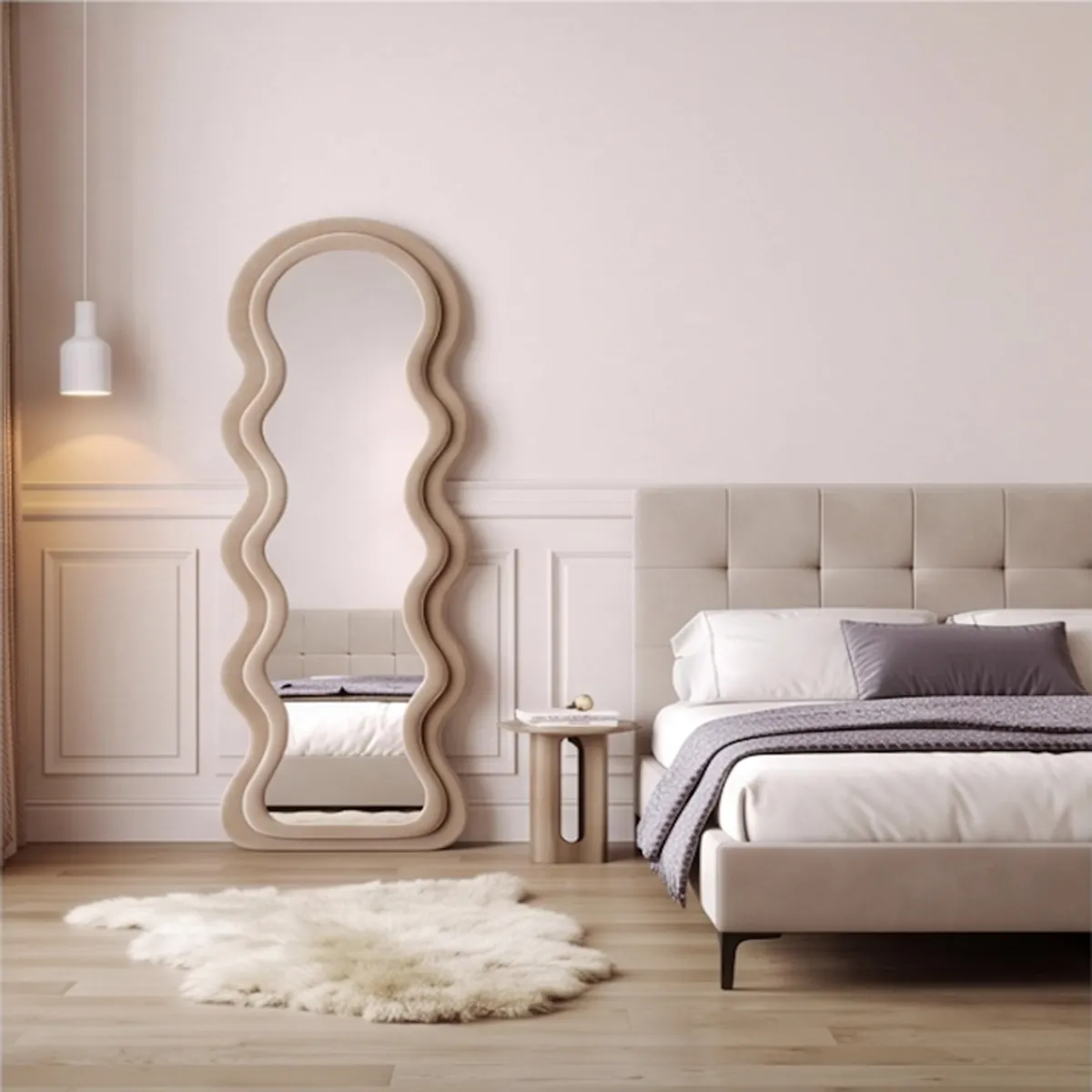 Brown full-length ripple mirror styled beside a bed