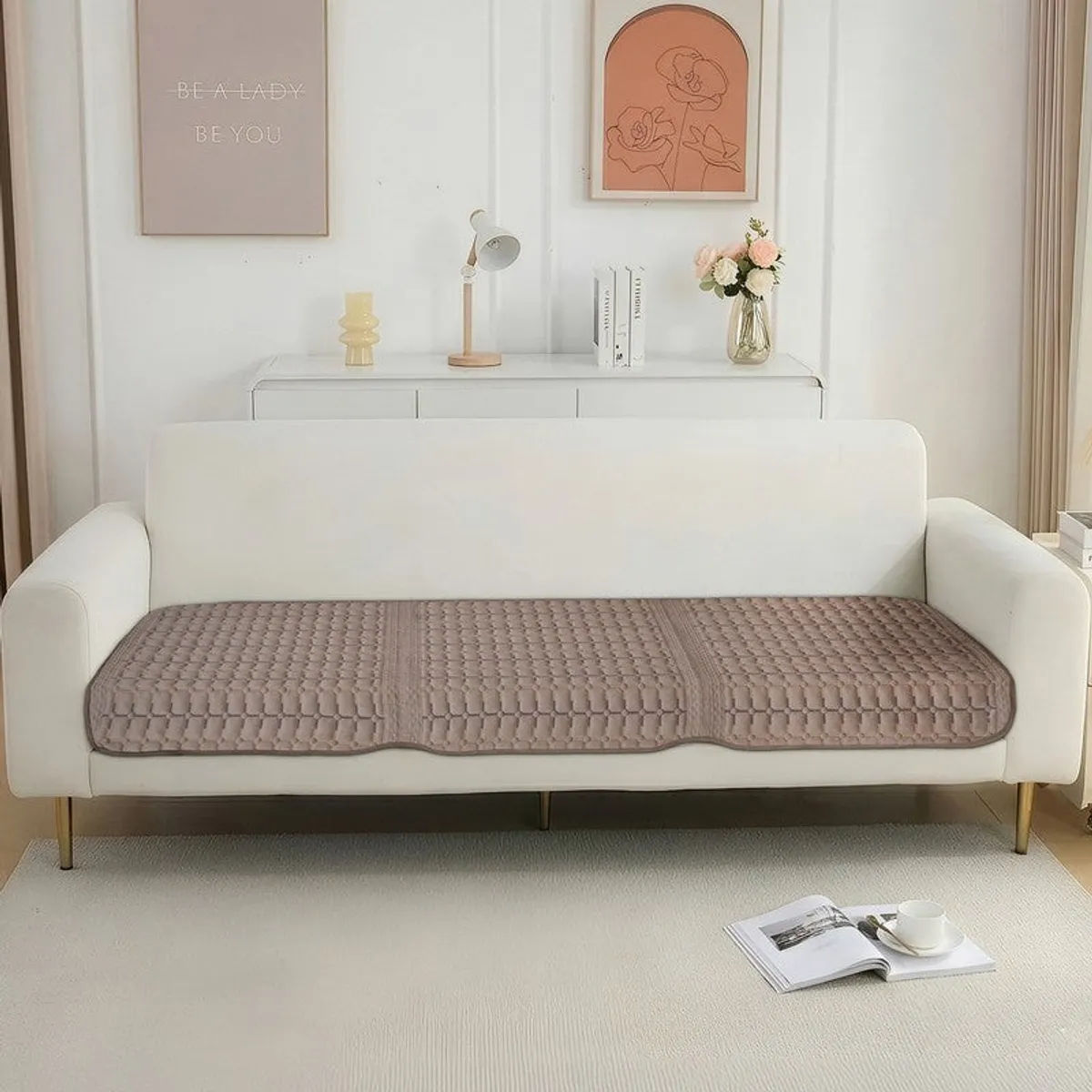 Brown geometric velvet cover fitted across a three-seater sofa