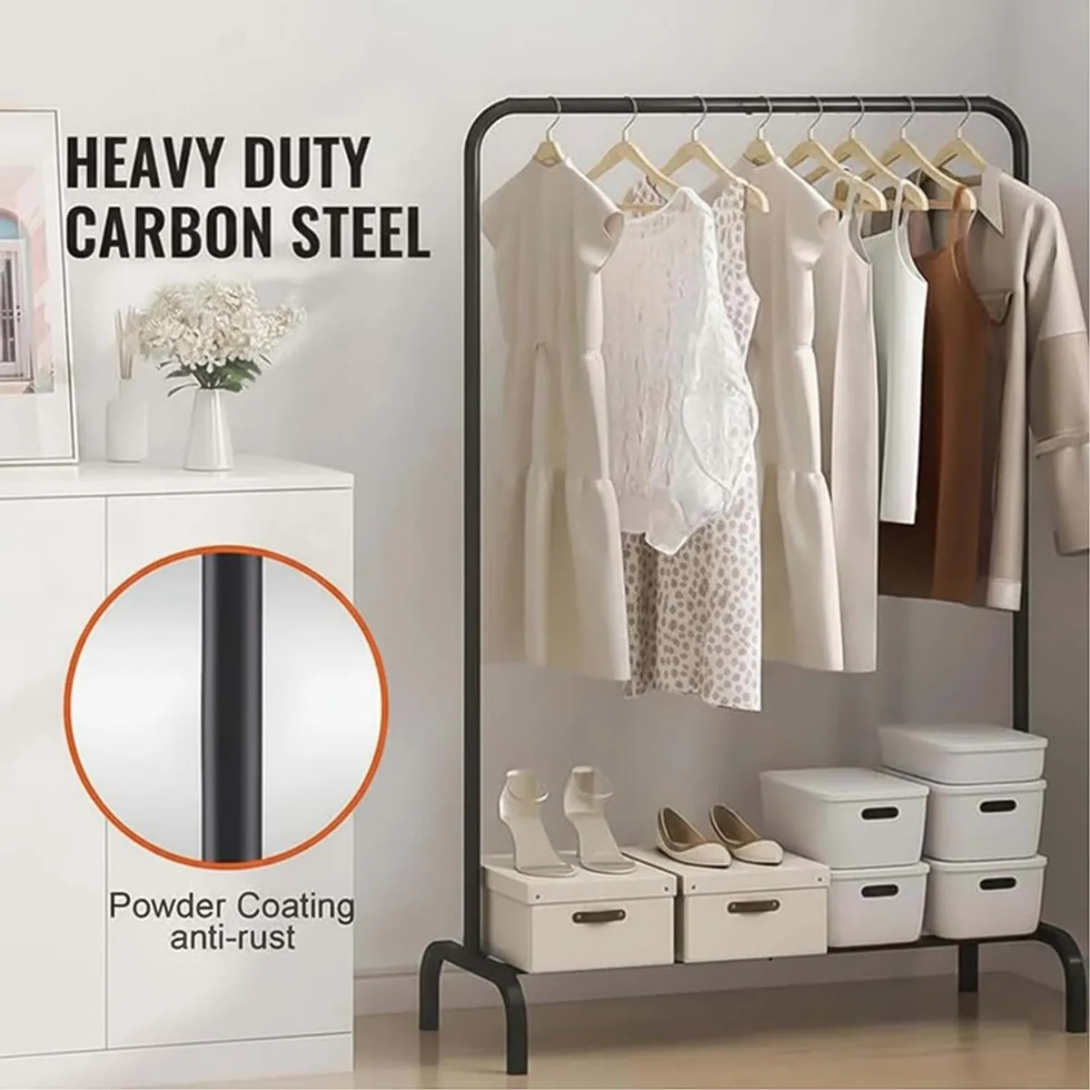 Black metal clothes rack with rounded frame and lower shelf