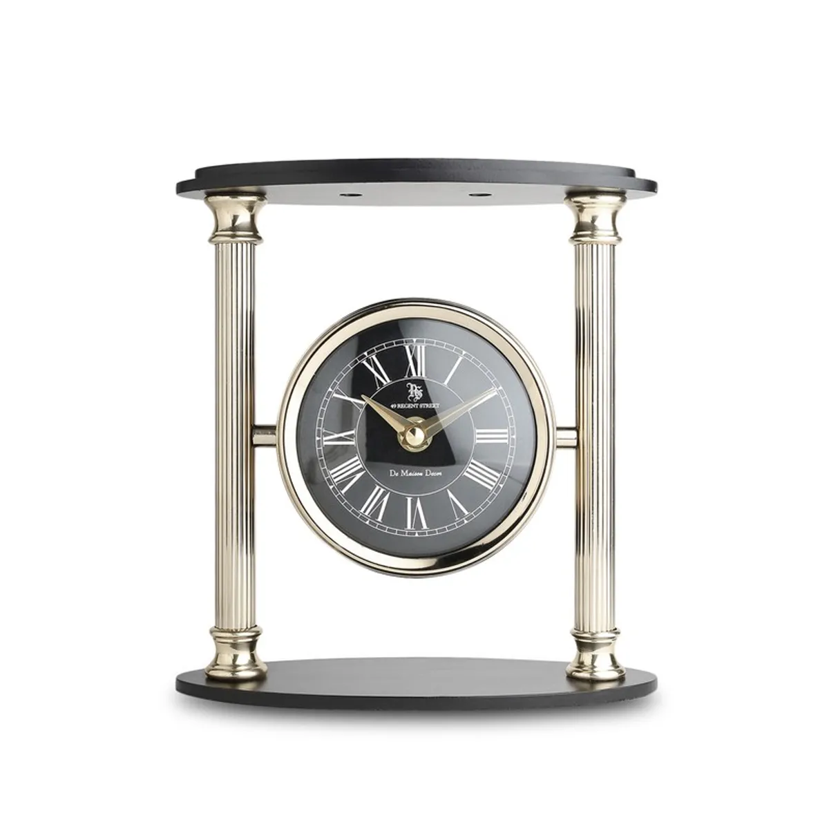 Studio front view of gold and black iron table clock
