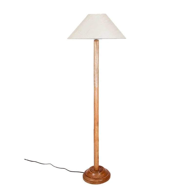 Isolated wooden floor lamp with an off-white cone shade and black cord on a white background.