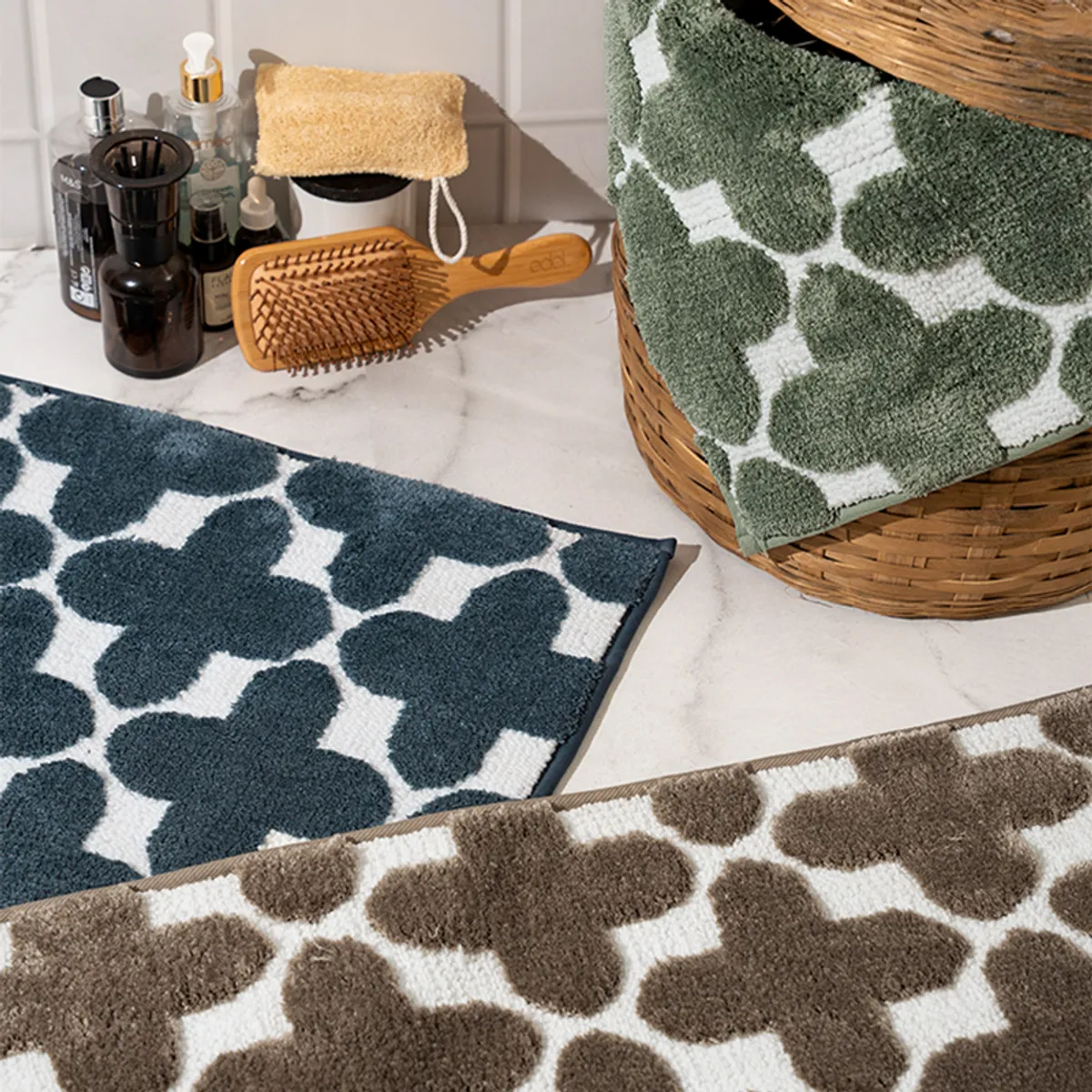 Blue and white bath mat styled in a contemporary bathroom setting