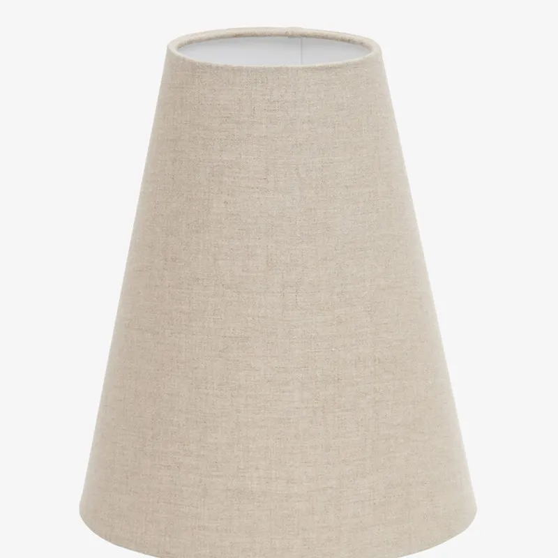 Close-up of the off-white tapered linen lamp shade