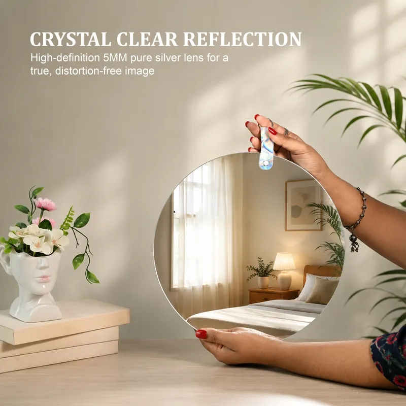Person holding a round frameless mirror with a reflective surface