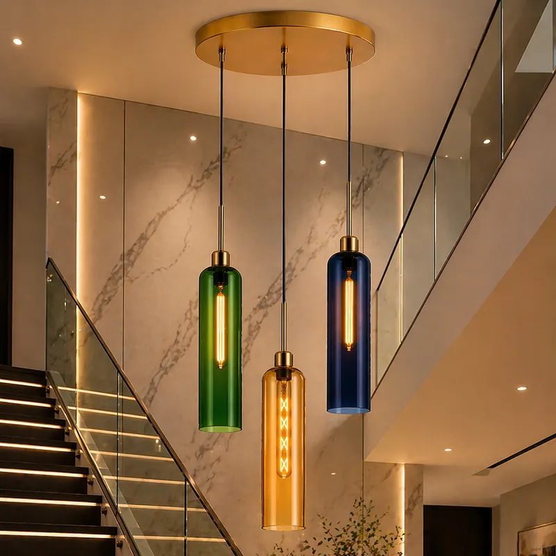 Coloured trio glass ceiling lamp with cylindrical shades in a staircase setting