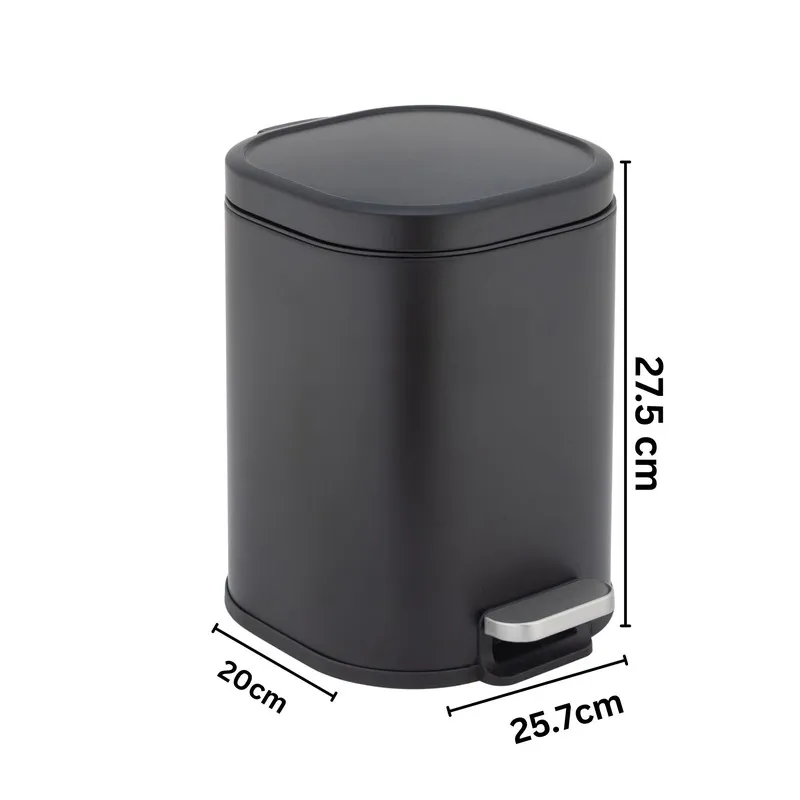 Black metal dustbin with pedal and printed size markings on a white background
