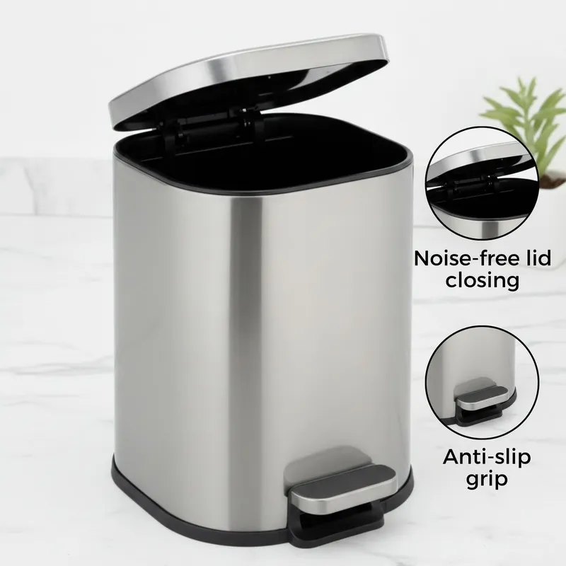 Silver metal dustbin with open lid and pedal