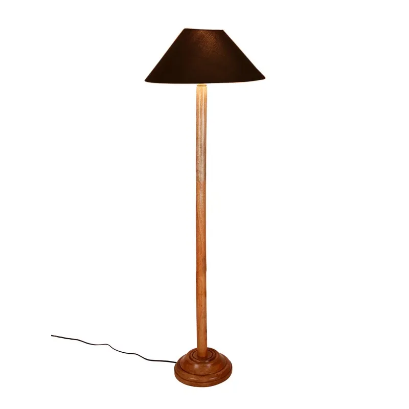 Wooden floor lamp with black shade on a white background