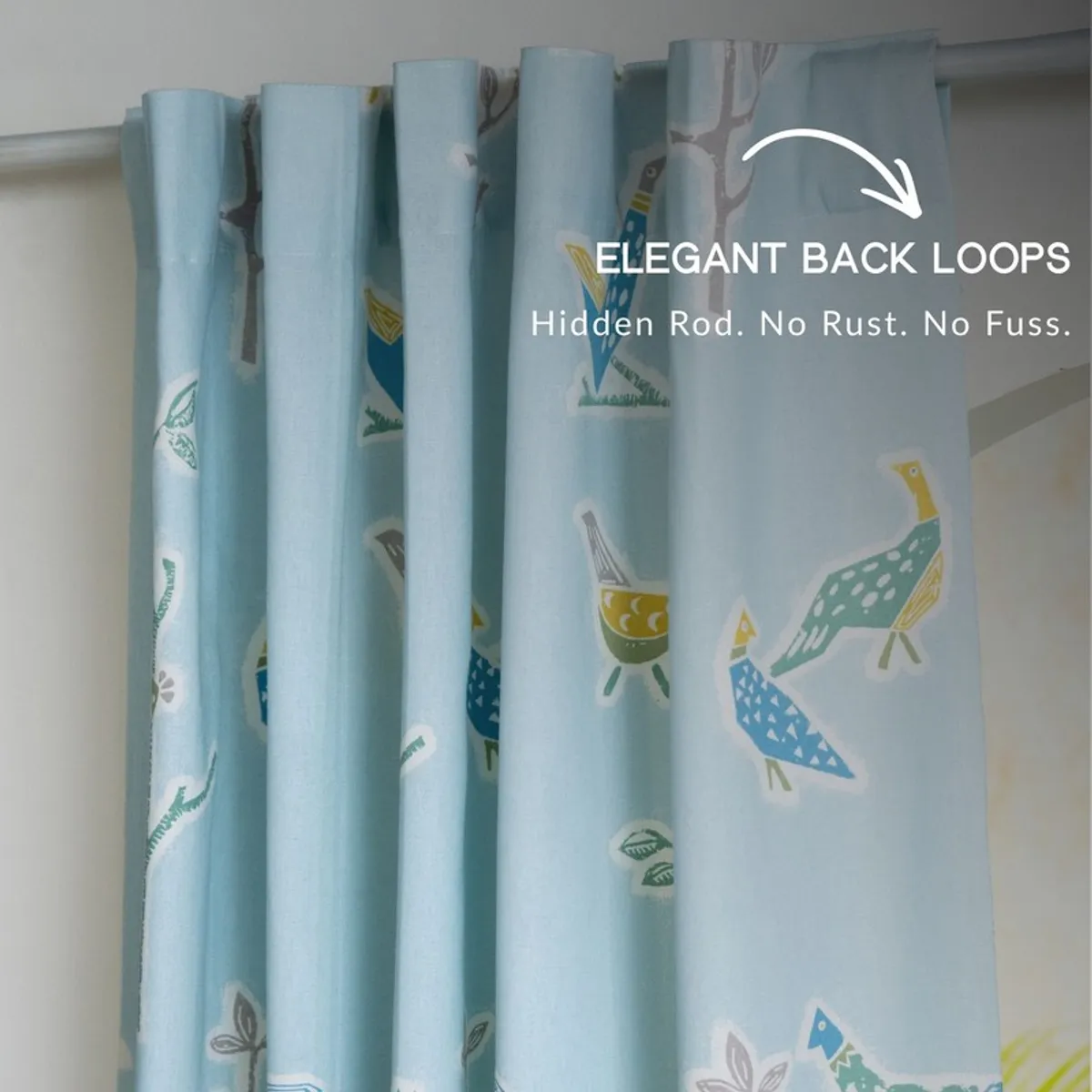 Close-up of back tab curtain top with colourful bird print